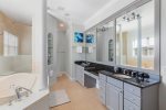 Each master bathroom offers a large walk-in closet, shower and his and hers sinks